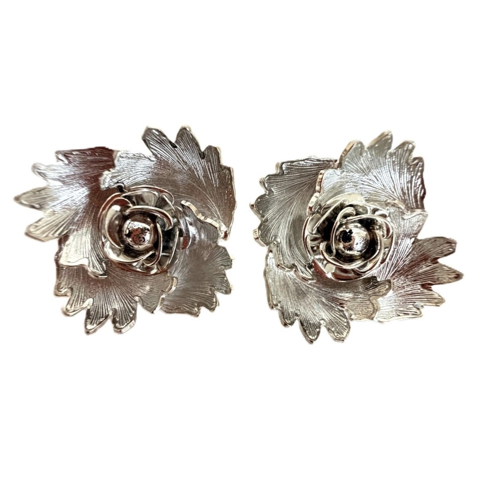 Rare and collectible vintage 1950s/1960s silver-tone clip-on earrings by Warner